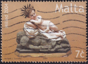 Мальта 2004 год . Бамбино из папье-маше на камнях . Каталог 0,5 €. (1)
